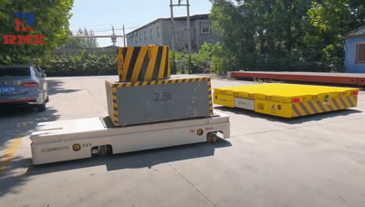 Heavy material trakless transfer trolley